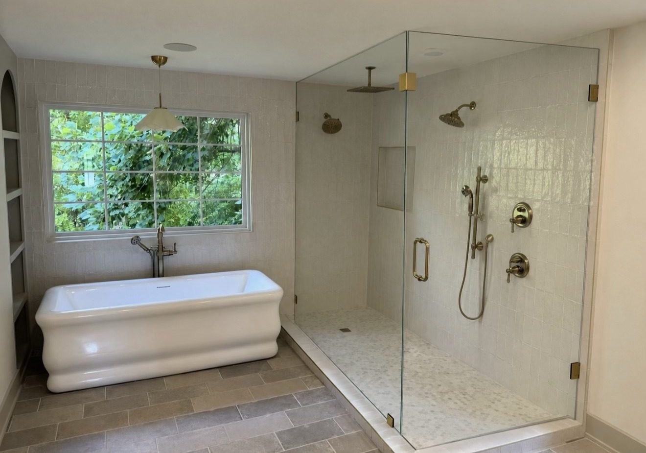 Primary bath with freestanding tub and glass shower